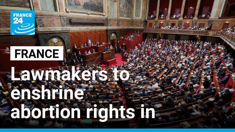 In this file photo, French President Emmanuel Macron addresses a special congress gathering both houses of parliament (the National Assembly and the Senate) in the Palace of Versailles outside Paris on July 9, 2018.